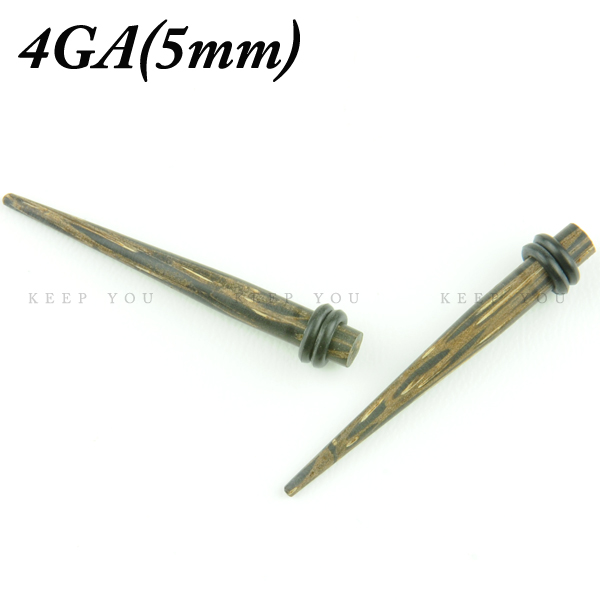 ボディピアス エキスパンダー ※天然素材・椰子の木素材の拡張器 【個数】1個 【サイズ】 4GA(5mm シャフト約45mm ) 【仕様】両側をゴムで固定いたします。 ホールアップにお使い下さい！ 【